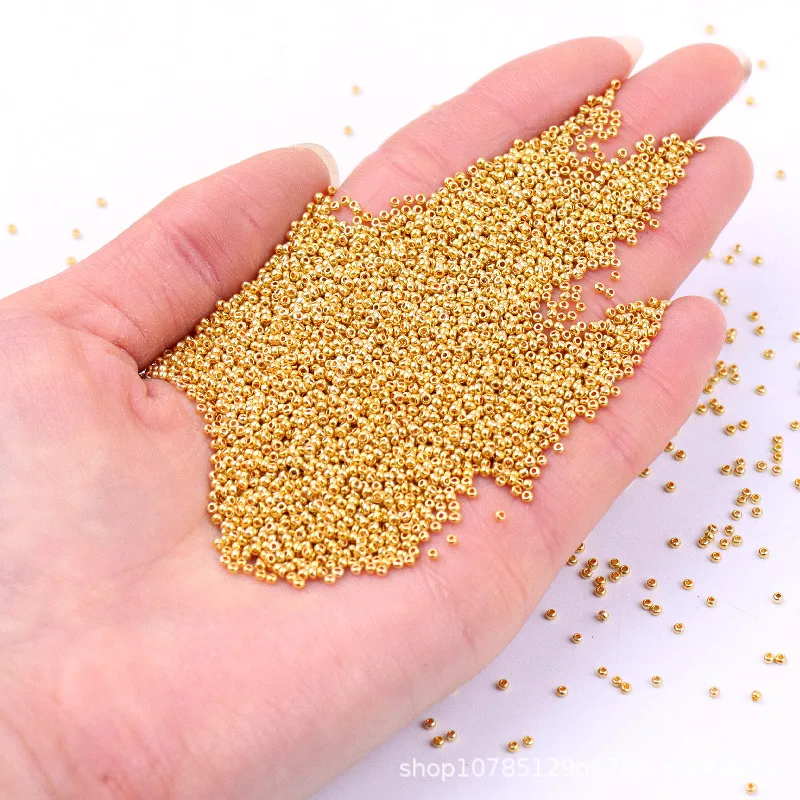 Hervorragende 1,5mm Gold-Glasreisperlen 15/0 Imitierte Dongbao Metallische Glasperlen DIY Handgefertigte Lose Perlen