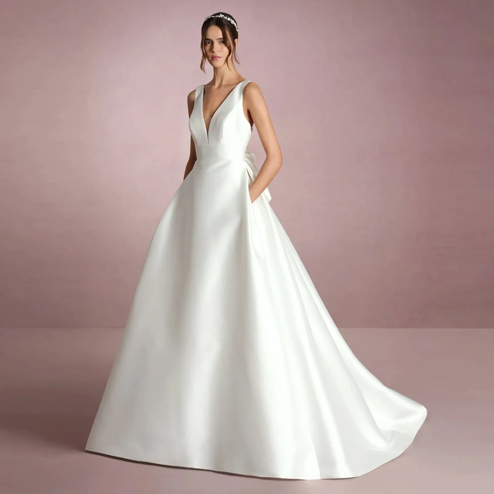 فساتين زفاف بسيطة بأشرطة واسعة على شكل حرف A لحفلات الزفاف ورقبة على شكل V عميقة مخصصة بطول الأرض سويب تراين فيستدوس دي نوفيا