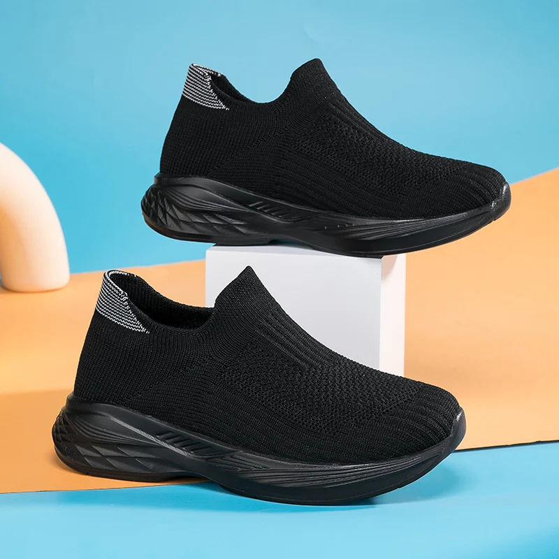 A pair of children's stretch knit slip on sneakers, lightweight comfy footwear for daily outdoor sports CH-686
