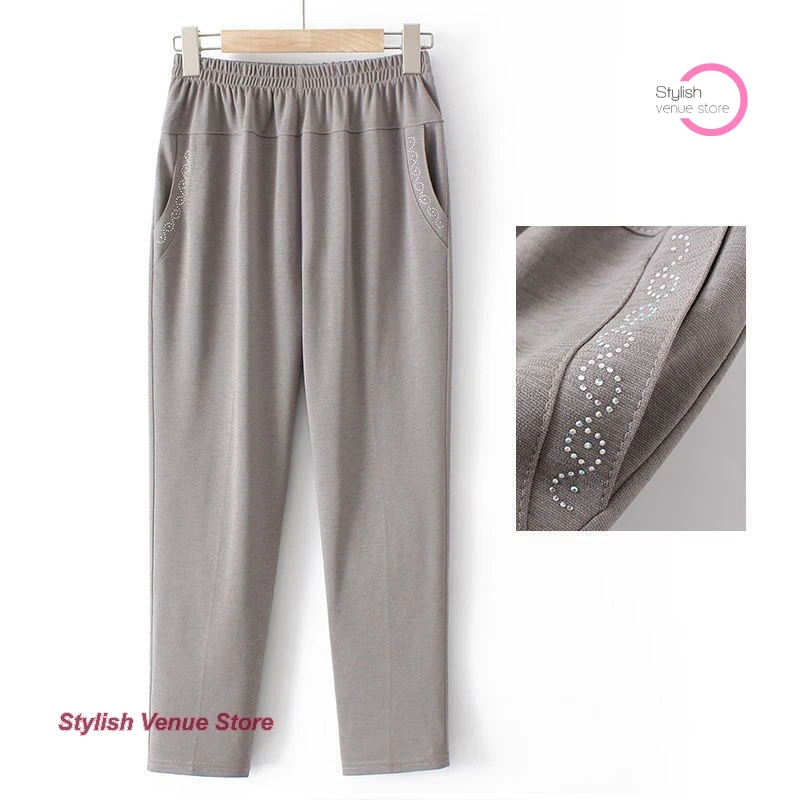 

Ice silk quick-drying pants female mother style plus size new thin breathable casual loose nine-point straight pants in summer.