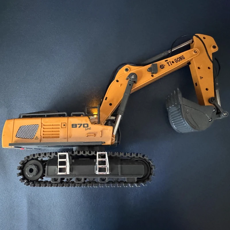 970 RC Mini Excavator 1/50 Scale รถขุดไฟฟ้าจําลองเดสก์ท็อป RC Excavator พร้อมระบบไฟส่องสว่าง RC รถของเล่นของขวัญ