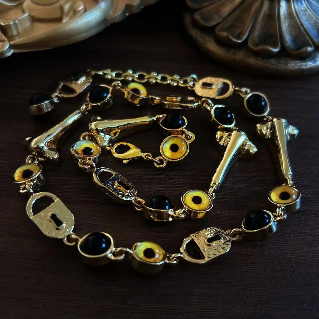 Vintage Devil's Eye European Schiaparelli eye nose mouth necklace earrings