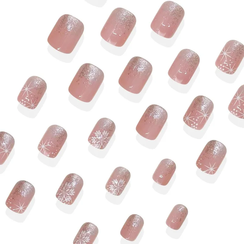 ชุดเล็บปลอม 24 ชิ้น คอลเลคชั่นฤดูหนาว สีเงินกลิตเตอร์ไล่เฉด พร้อมเกล็ดหิมะสีขาวและดาวสี่แฉก ของขวัญที่สมบูรณ์แบบสำหรับสาวๆ