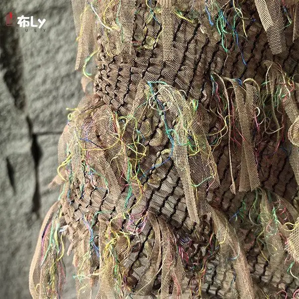 

Irregularly woven mesh burnout three-dimensional tassel fabric, ethnic style clothing designer fabric