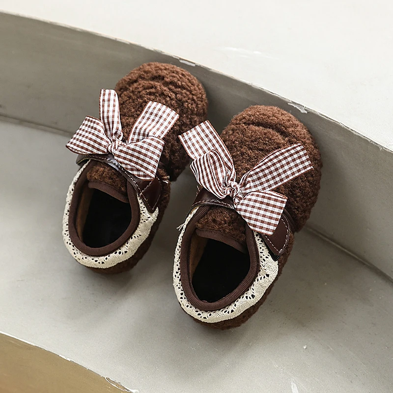 2025 الأطفال أفخم أحذية الخريف الشتاء جديد الفتيات حذاء مسطح في الهواء الطلق الأميرة الحلو Bowknot الدافئة فروي الاطفال أحذية قطنية