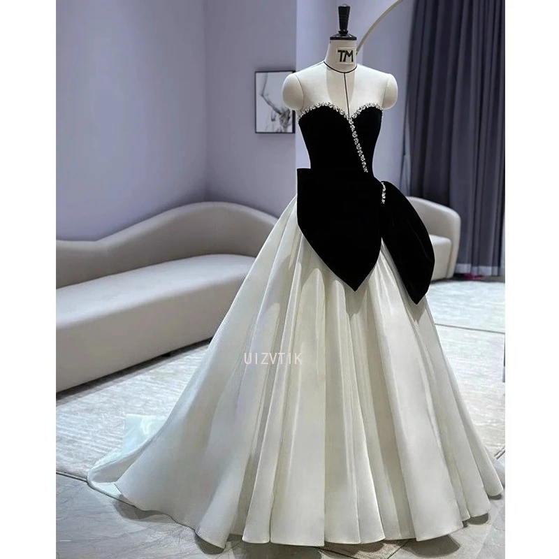 أسود أبيض منتفخ فساتين الزفاف قبالة الكتف المخملية صد بلورات مساء اللباس Peplum لامعة تنورة المشاهير اللباس الرسمي
