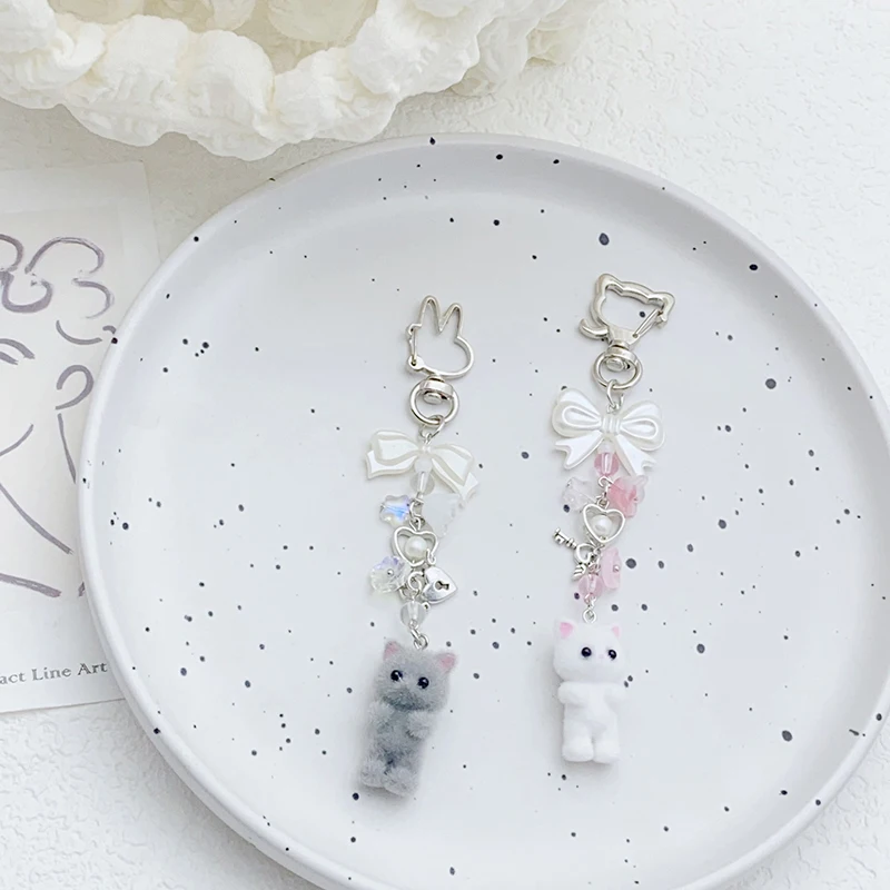 1PC Auto Schlüssel Halter Beflockung Katze Schlüsselring Bowknot Kleine Blume Perle Anhänger Telefon Lanyard Tier Schlüssel Kette Charme Zubehör