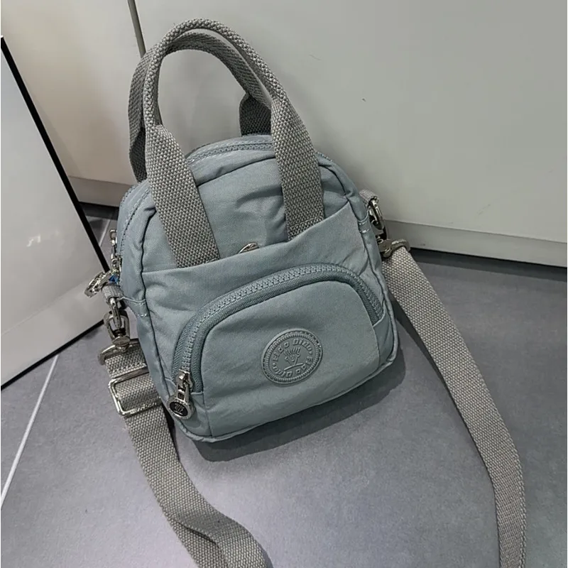 

FIDO DIDO 2025 New Women's Handbag Crossbody Bag Multi-layer Metal Zipper Oxford Waterproof Versatile Fashionable Genuine 2546-1