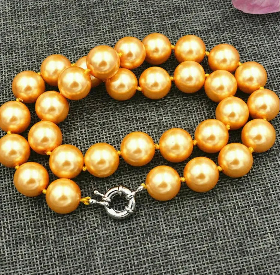 

12mm gold Nanhai shell Black Pearl Round Pearl Necklace 18 "AA