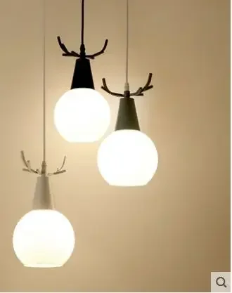 Restaurant Nordic simple modern three-head creative family dining room table antler lamps