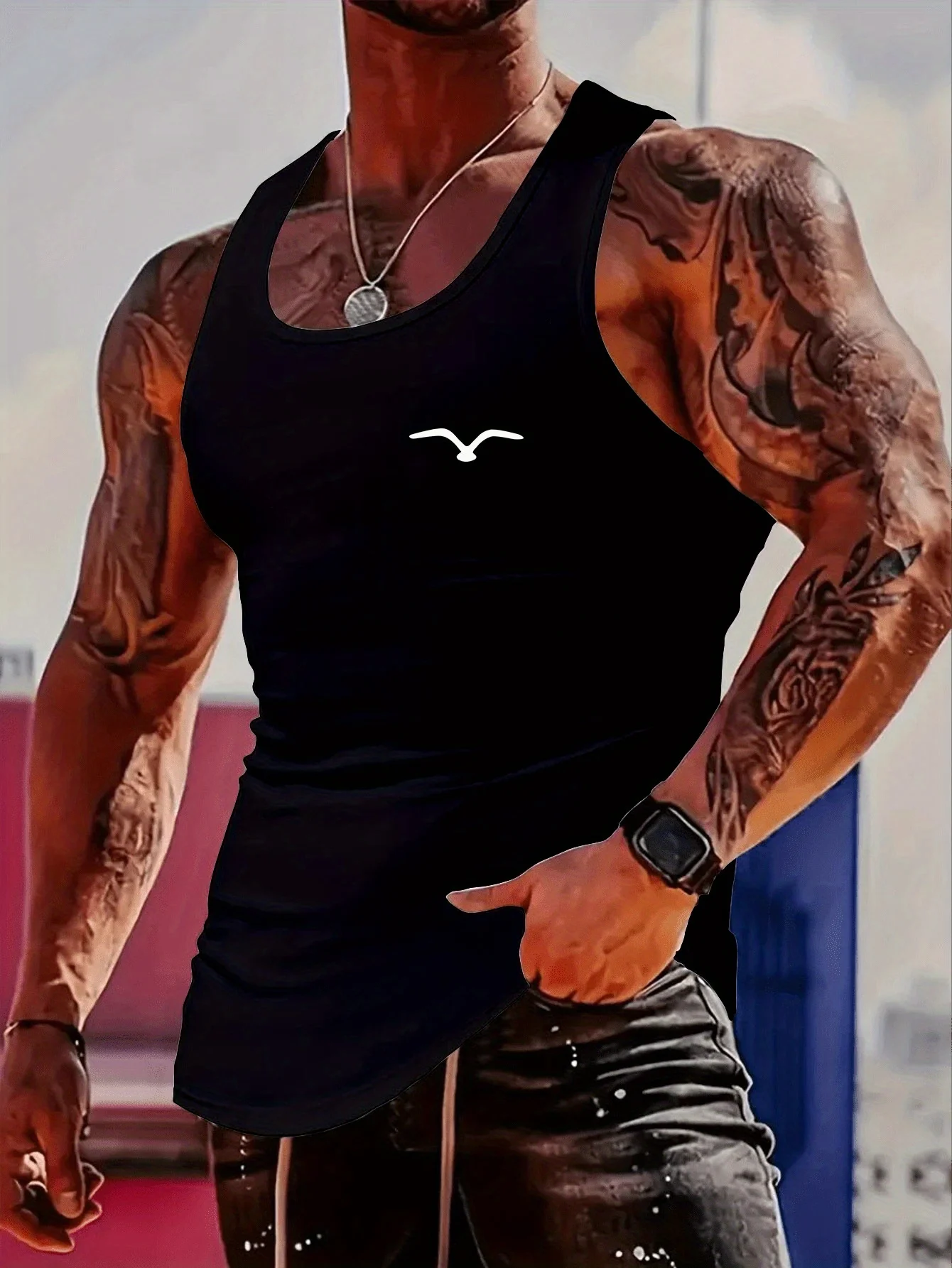 

Fashionable trend muscular man. Simple and creative hand-painted eagle on the chest. Printed vest.