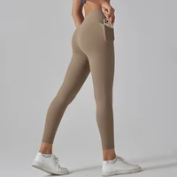Mallas deportivas de sensación desnuda con bolsillo para mujer, pantalones de Yoga para correr, Leggings de energía de cintura alta, Leggings de gimnasio para niña