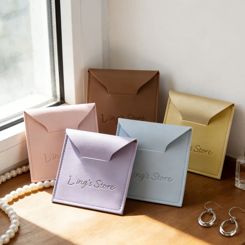 

100pc Leather Wedding Favor Gift Bag Envelope Pouch Small Ring Earring Necklace Pendant Storage Package Jewelry Packaging Case