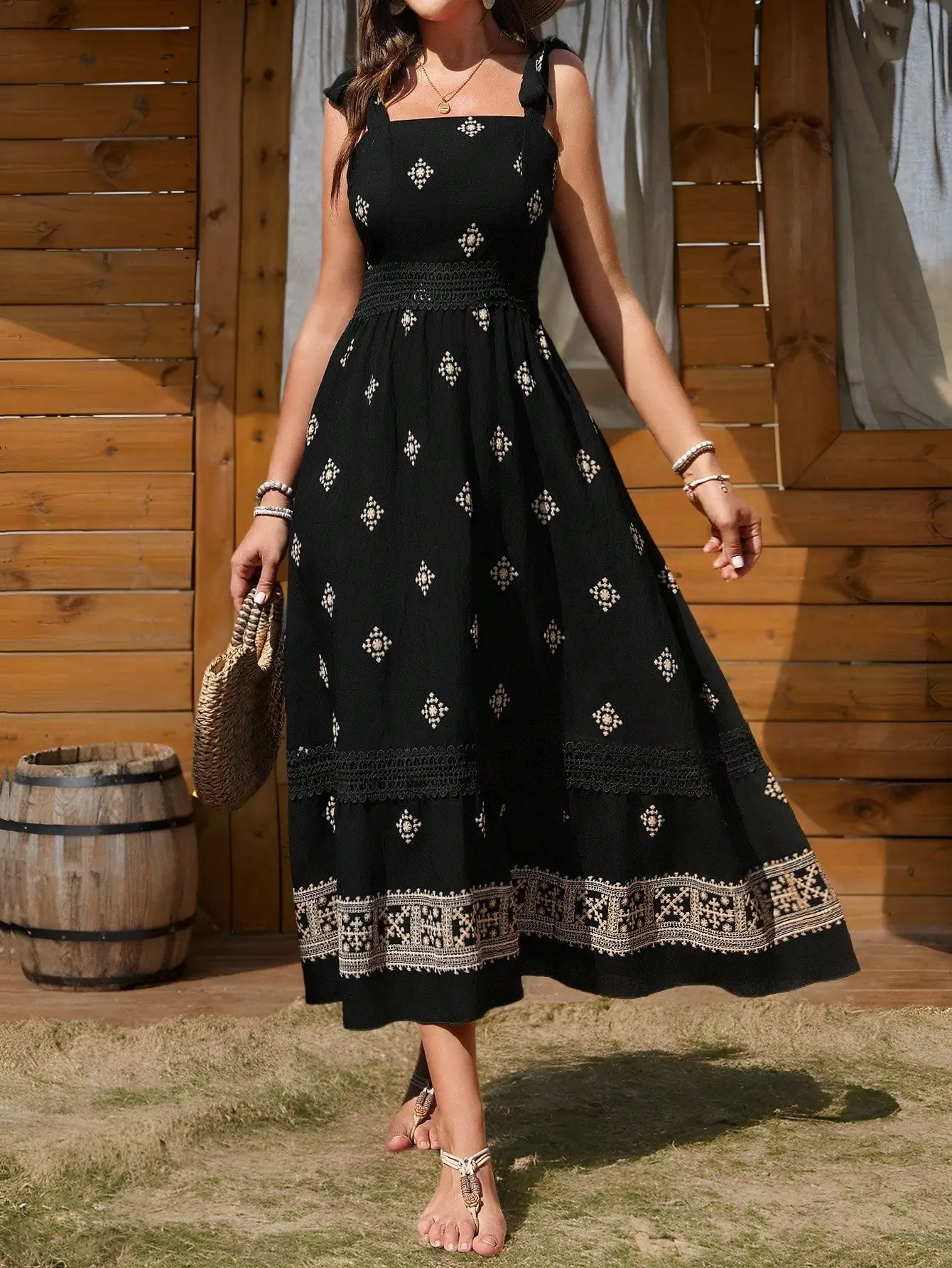 

Black Embroidered Bohemian Midi Dress with Square Neck and Tiered Skirt