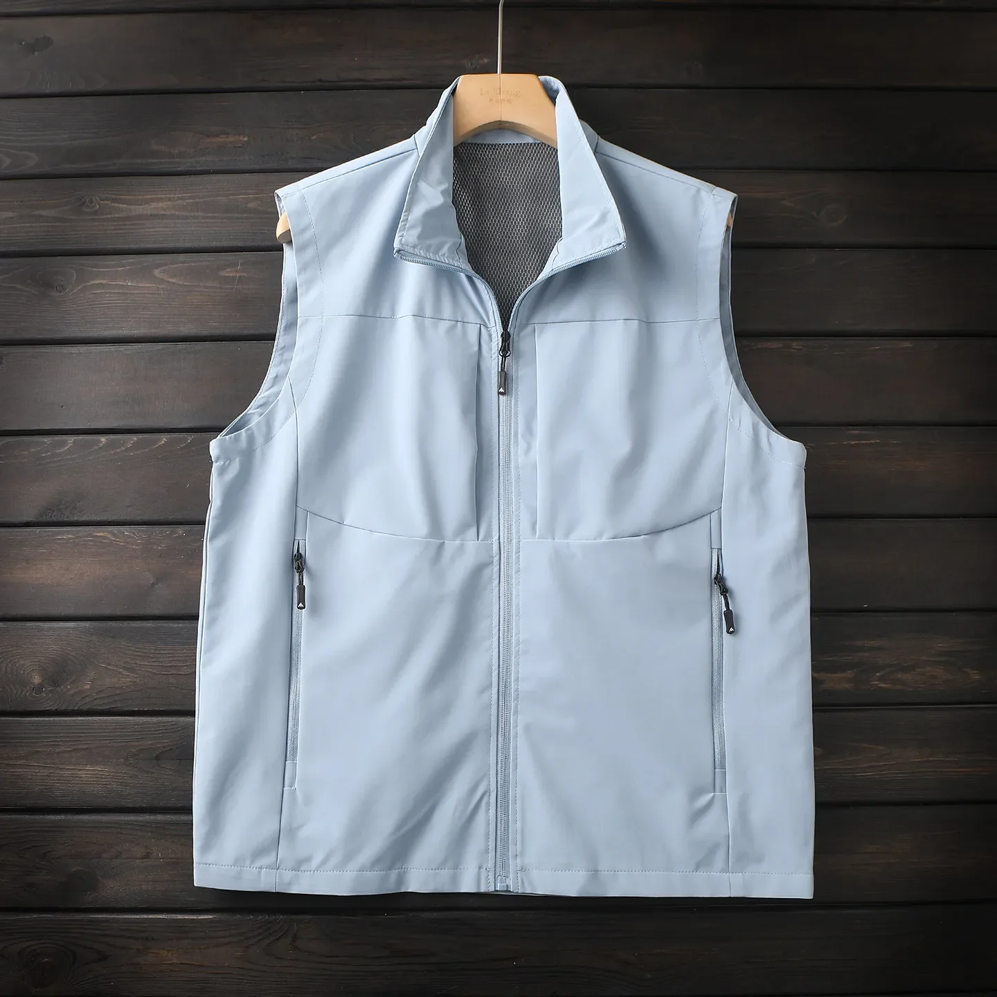 There are large sizes, European and American men's outdoor waterproof and breathable multi-pocket stand-up collar vest.