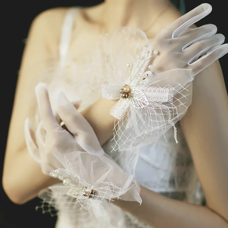 

Bridal Gloves Short Korean Transparent Mesh Lace Leaf Bead Buckle Bow Wedding Gloves Wholesale