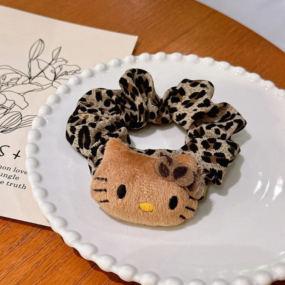 Sanrio Hello Kitty estampado de leopardo pinzas para el cabello y lazos para el cabello de bebé Otoño/Invierno pinzas para el cabello de moda para niña regalos de vacaciones