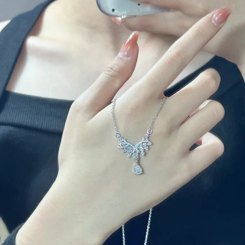 

MDL стиль муассанита. Сверкающие крылья ангела-капли, легкое роскошное ожерелье, подвеска в виде капли из искусственного муасса из натурального бриллиантового пера