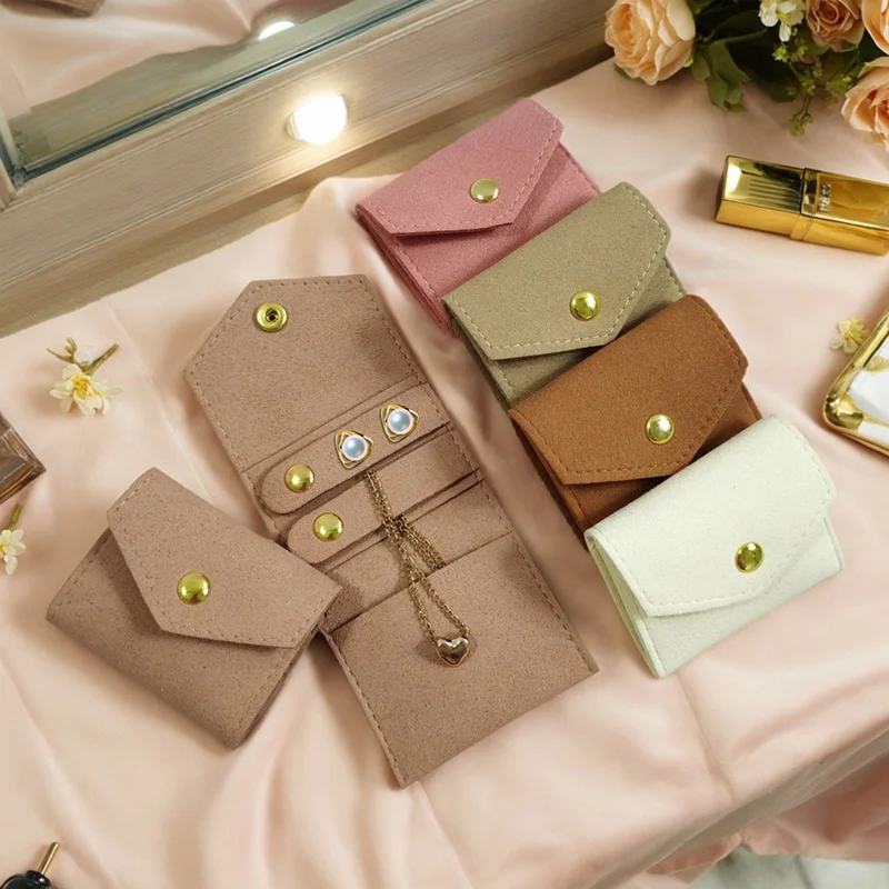 Tragbare Reise-Multifunktions-Schmuckaufbewahrungsrolle, praktische Mini-Aufbewahrungstasche für Ohrringe, Ringe, Halsketten, Schmuck