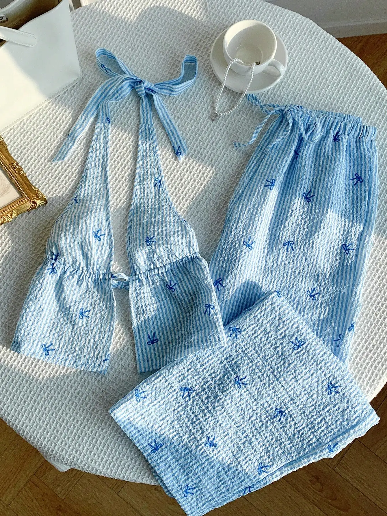 Blauw gestreepte 2-delige set: halter crop top en losse broek met wijde pijpen met strikprint, zomerstrandresortkleding voor dames