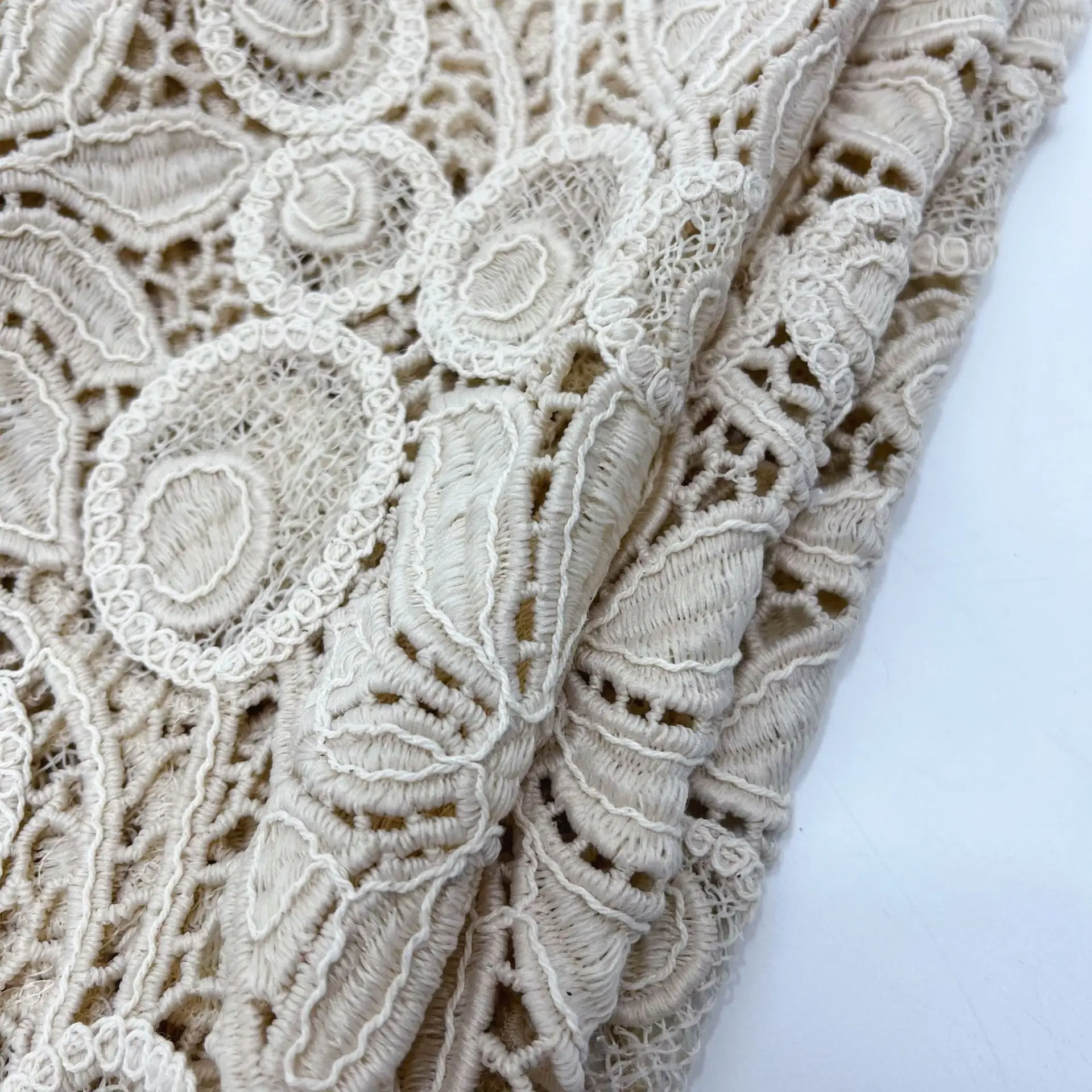 

High-end laser cotton thread embroidery water-soluble milk silk hollow embroidery fabric in beige women's clothing fabric