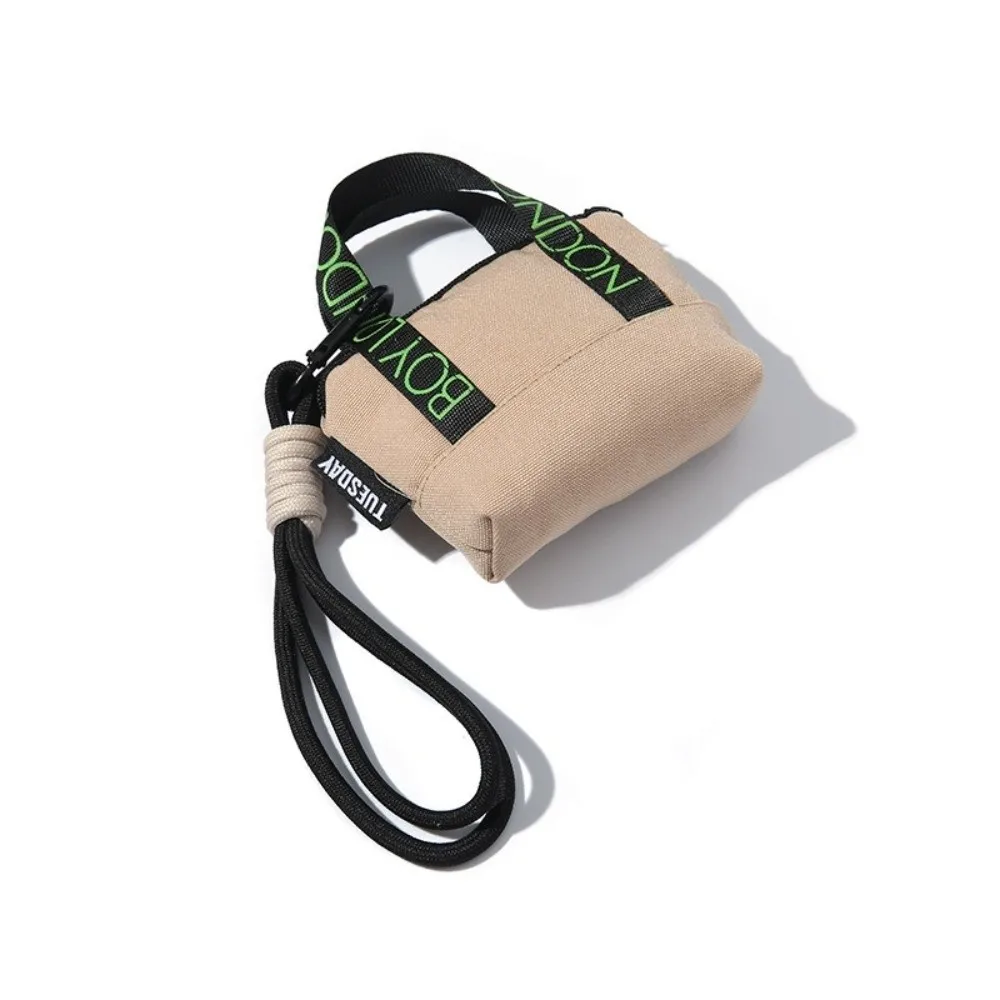 محفظة نقود معدنية صغيرة جديدة من القماش مع سوار معصم لسماعة الأذن وحامل بطاقات وردي من Dopaamine