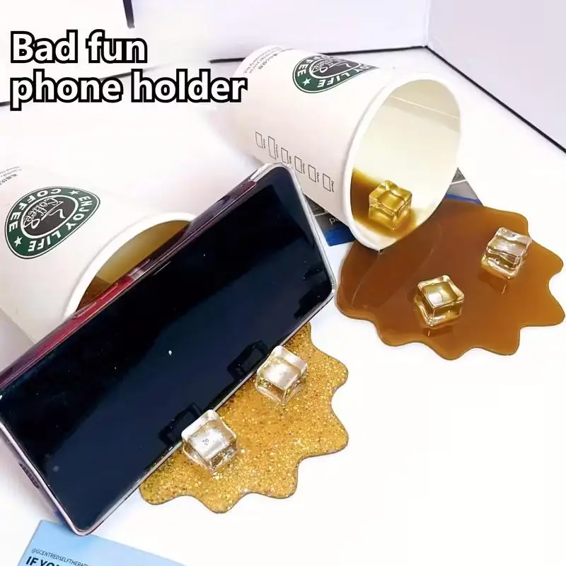 Spilled Coffee Cup Phone Stand - Funny Prank Home Decor with Non-Slip Base, Perfect Gift for Office & Desk