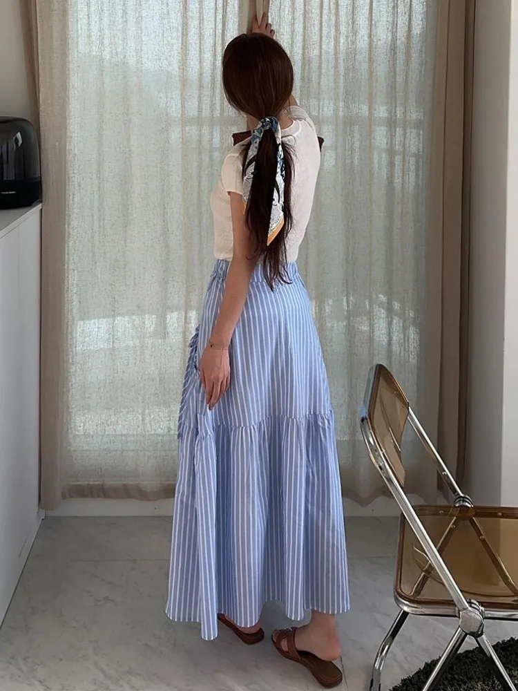 Letnia, elegancka spódnica maxi w paski z wysokim stanem, rozkloszowana, z dużymi kieszeniami, damska, w stylu vintage, do noszenia na co dzień.