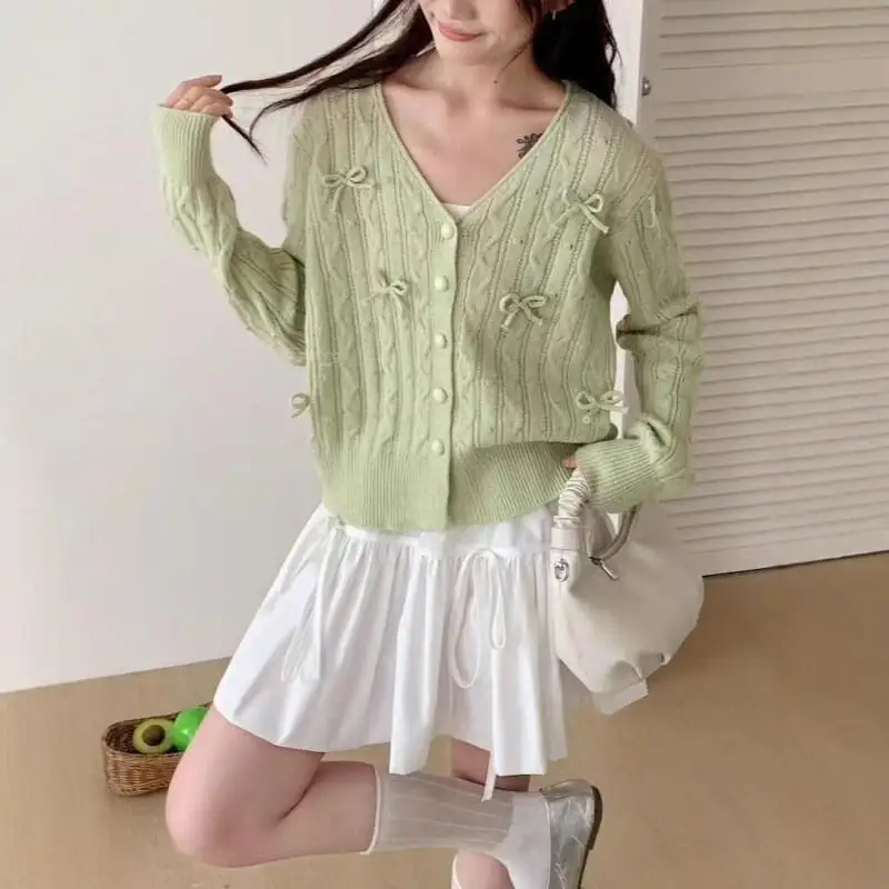 

Three Dimensional Bow Women's Knitted Cardigan New Soft Sweater for Autumn and Winter Gentle and Sweet Wind Sweater
