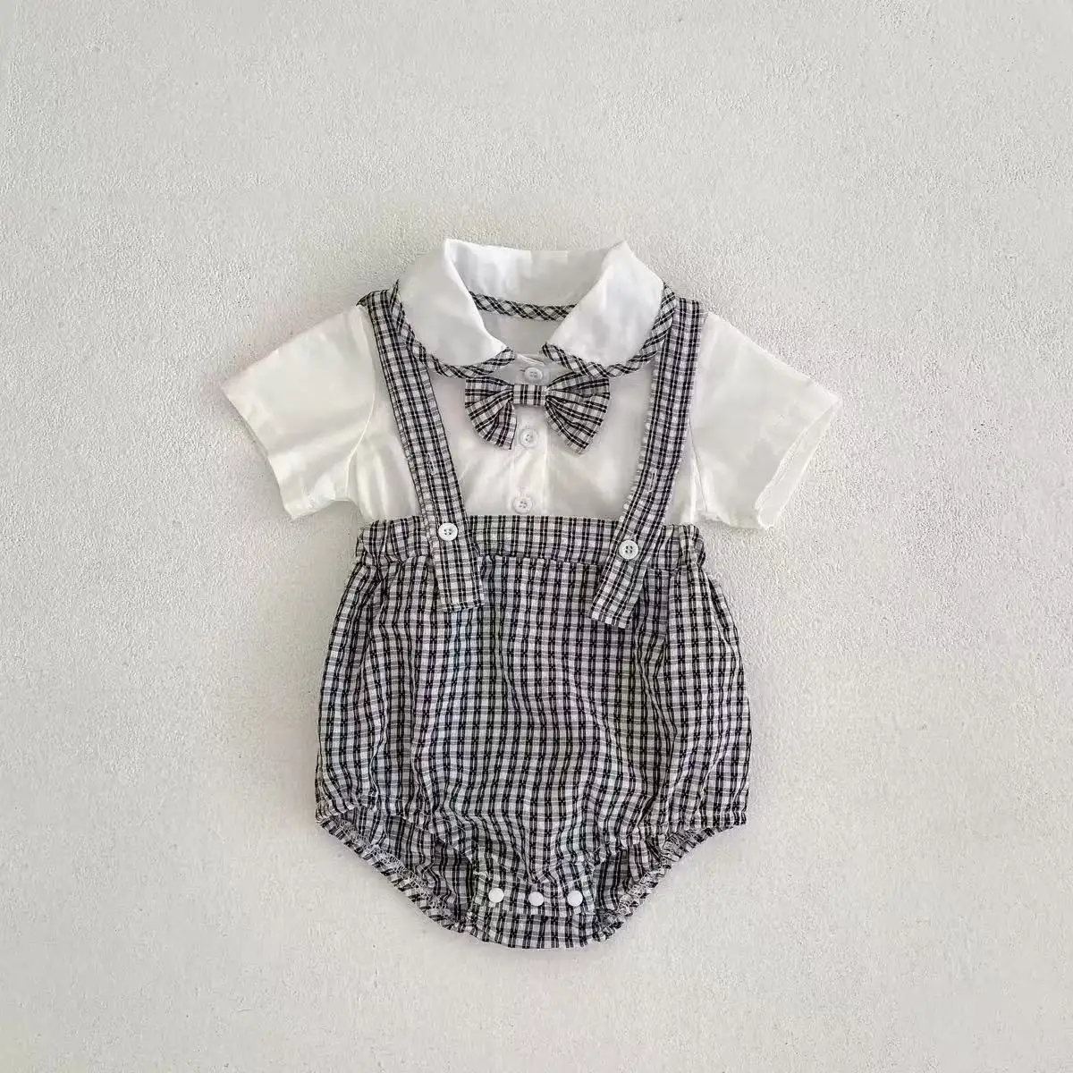 

2025 Instagram summer new baby jumpsuit, male and female baby doll collar, plaid fake two-piece triangular jumpsuit, crawling
