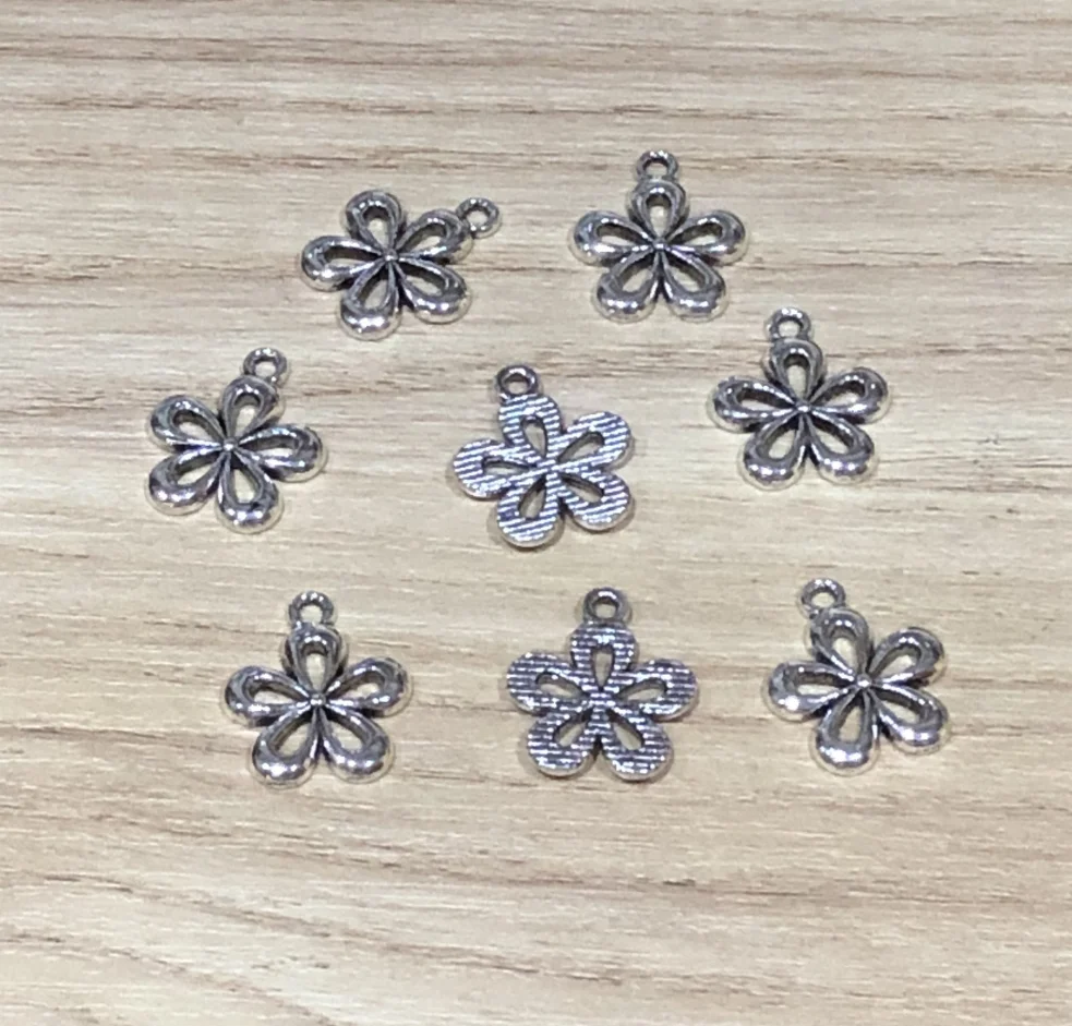 

35pcs 15*18mm Alloy metal tibetan silver hollow flower shaped pendants for jewelry handmade HW2685
