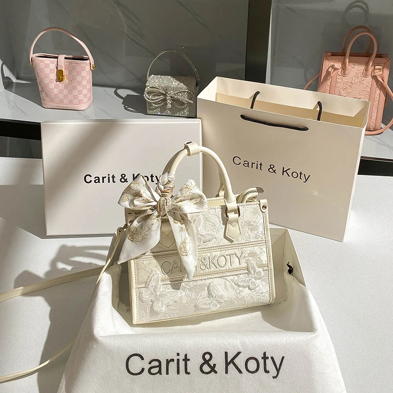 

Новая китайская кружевная сумка в китайском стиле, нишевая сумка-тоут с бантом и большой вместимостью.