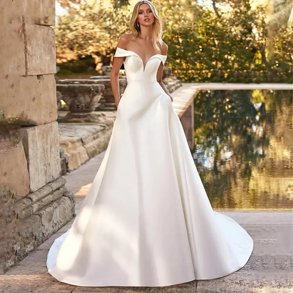

The new Uya Princess a Line Modern Luxury Wedding dress V-neck floor Length sexy backless decal Bridal Ball party dress Custom