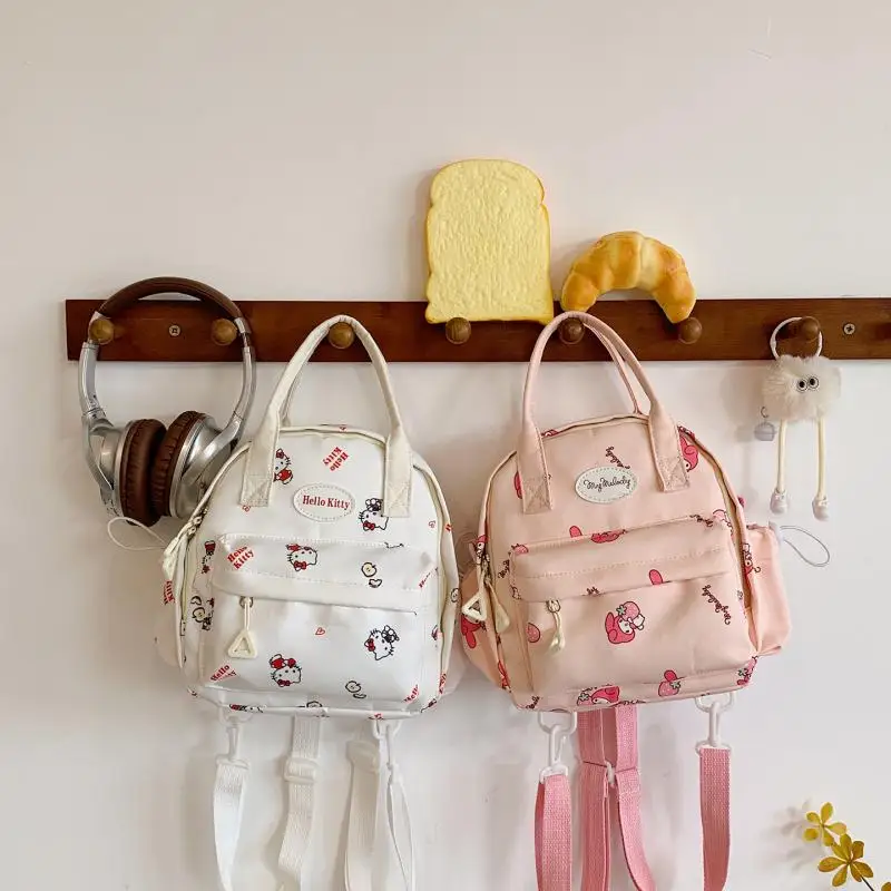

Sanrio New Cartoon Printed Backpack HelloKitty Casual Fashion Backpack Kawaii Girls' Handheld Crossbody Bag Student Backpack