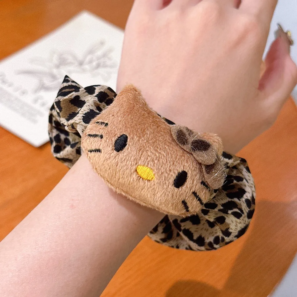 Sanrio Hello Kitty estampado de leopardo pinzas para el cabello y lazos para el cabello de bebé Otoño/Invierno pinzas para el cabello de moda para niña regalos de vacaciones