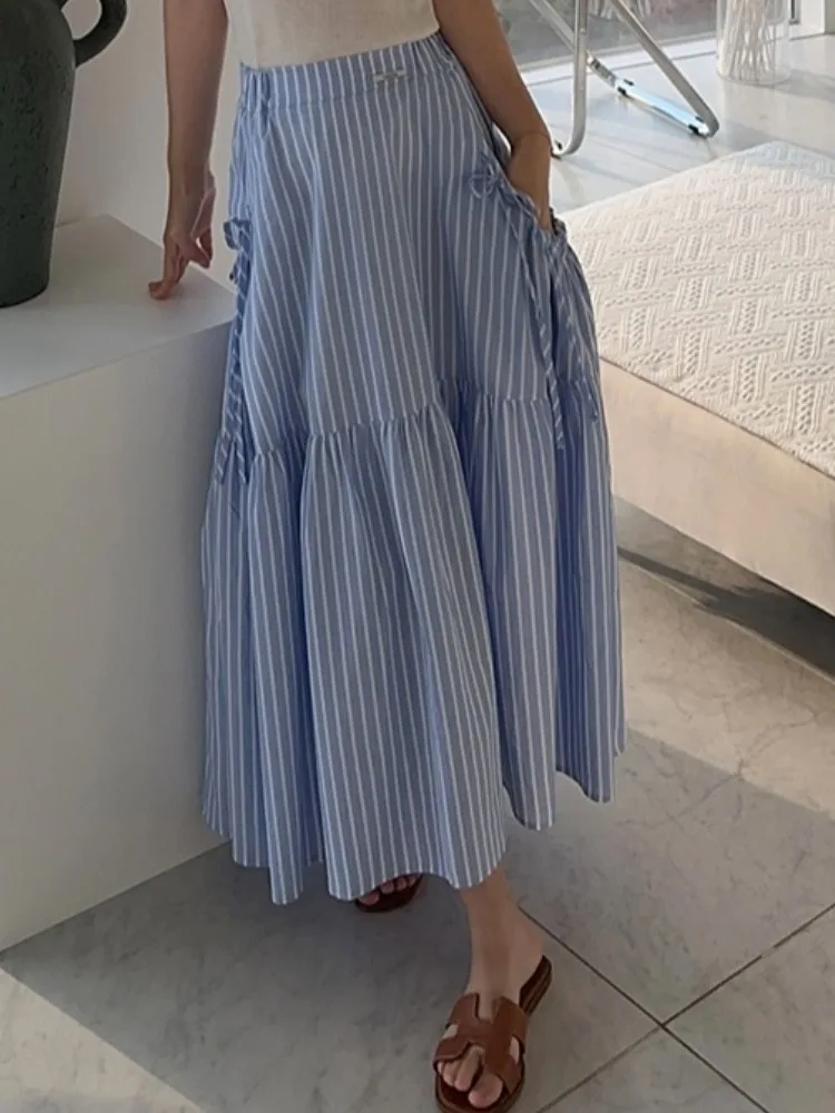 Letnia, elegancka spódnica maxi w paski z wysokim stanem, rozkloszowana, z dużymi kieszeniami, damska, w stylu vintage, do noszenia na co dzień.