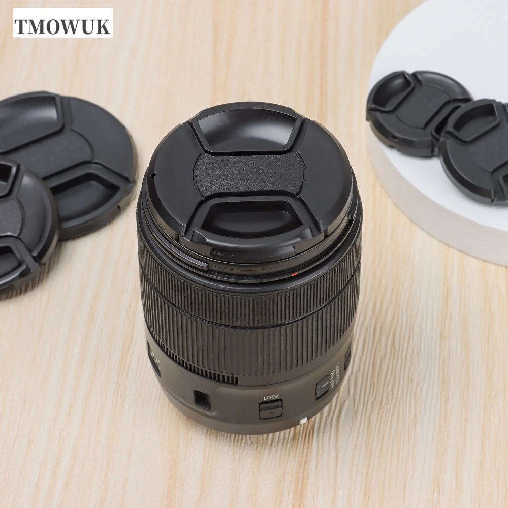 Per Nikon D5200 D5300 D5500 D5600 D600 D610 D7000 D7100 D7200 D7500 Tappo dell'obiettivo della fotocamera Coperchio protettivo Pizzico centrale Snap-on 49mm 5