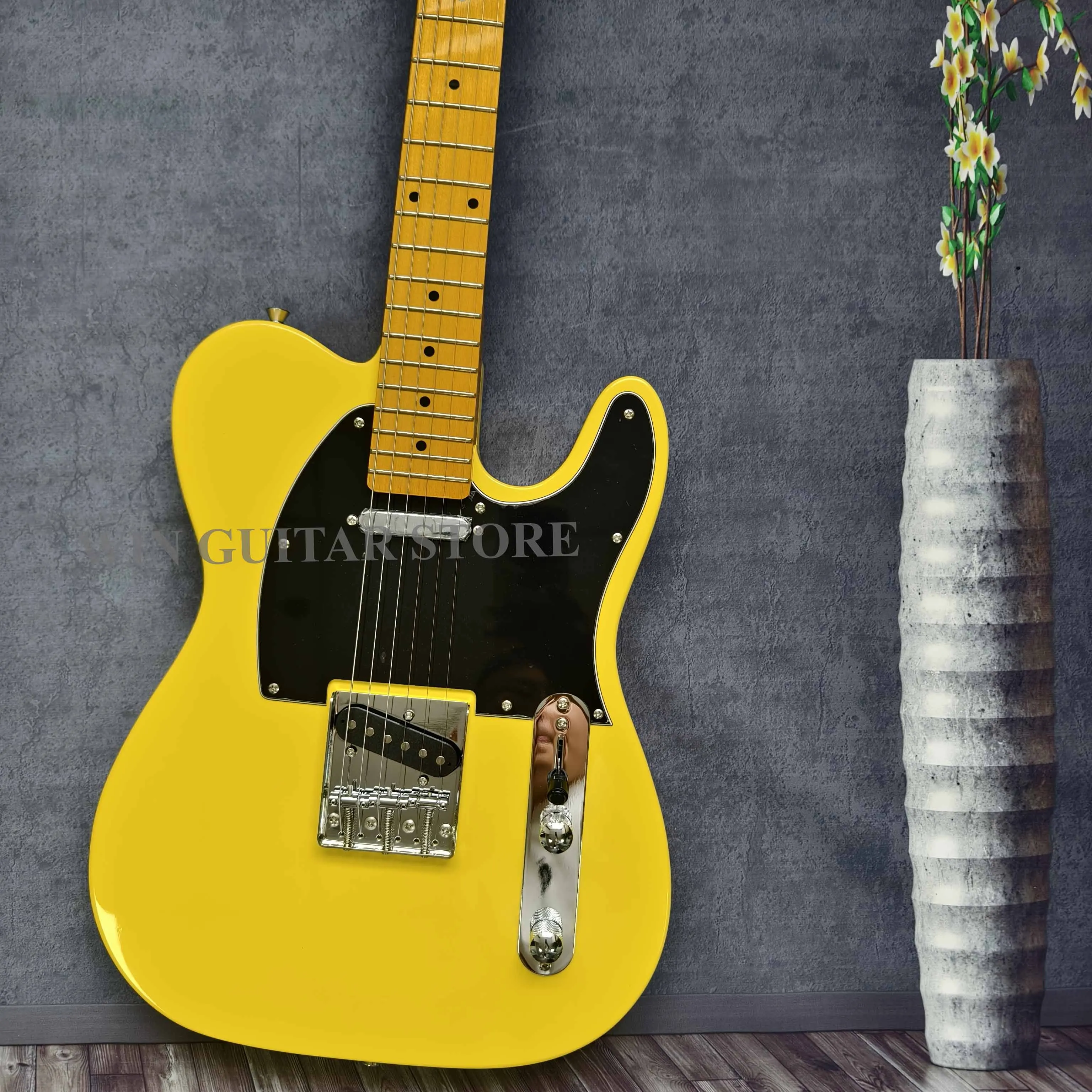 US-Lager Gelbe E-Gitarre Solid Body 6-saitiges synchronisiertes Tremolo Ein Weihnachtsgeschenk Kostenloser Versand