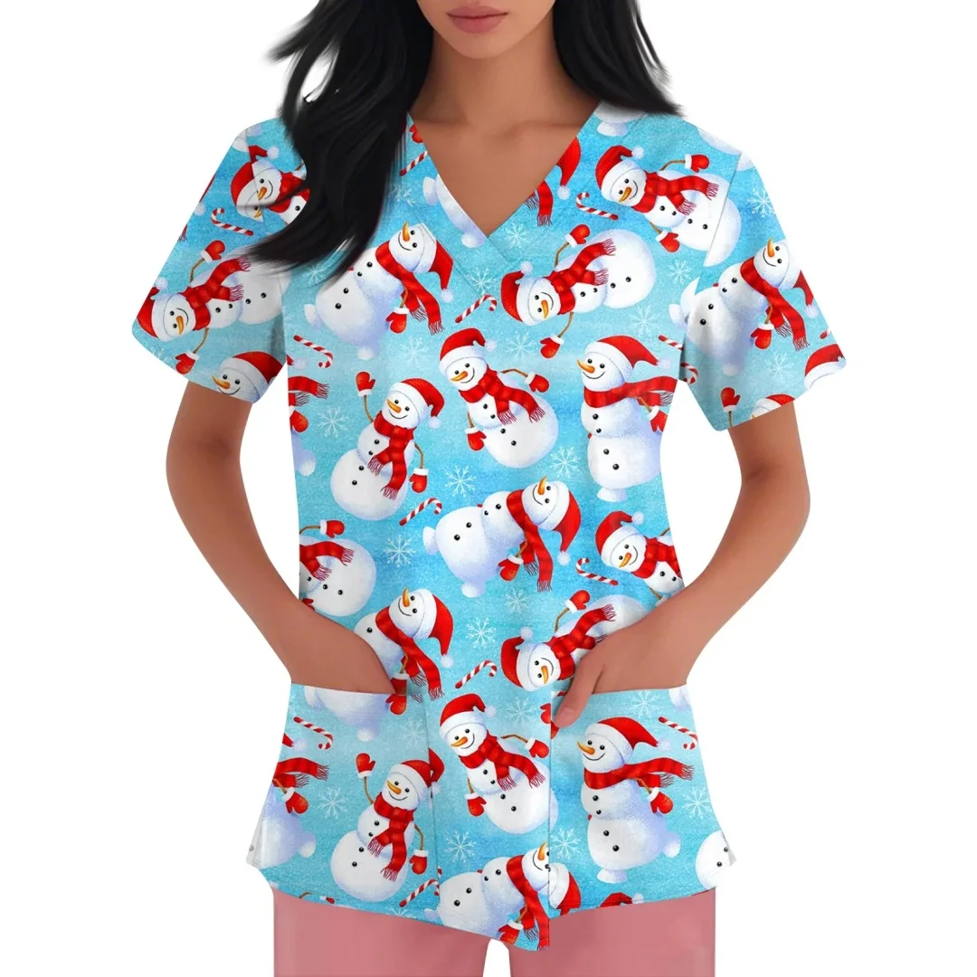 เสื้อยืดพยาบาลแขนสั้นลายคริสต์มาสสำหรับผู้หญิง ลายซานต้า เกล็ดหิมะ ขนมปังขิง คอวี มีกระเป๋า ของขวัญสำหรับพยาบาล