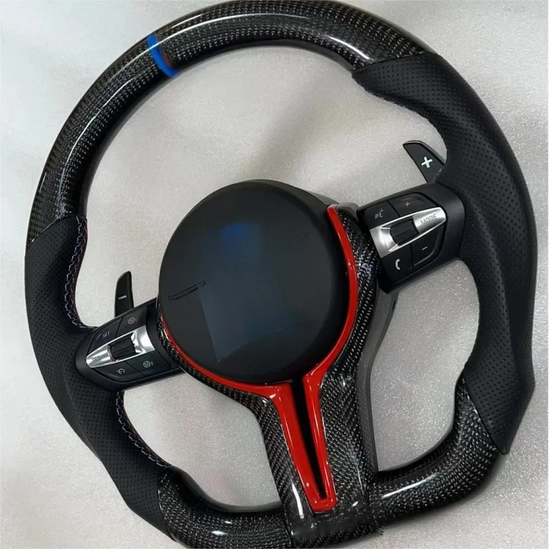 

Carbon fiber steering wheel with paddle shifters & airbag