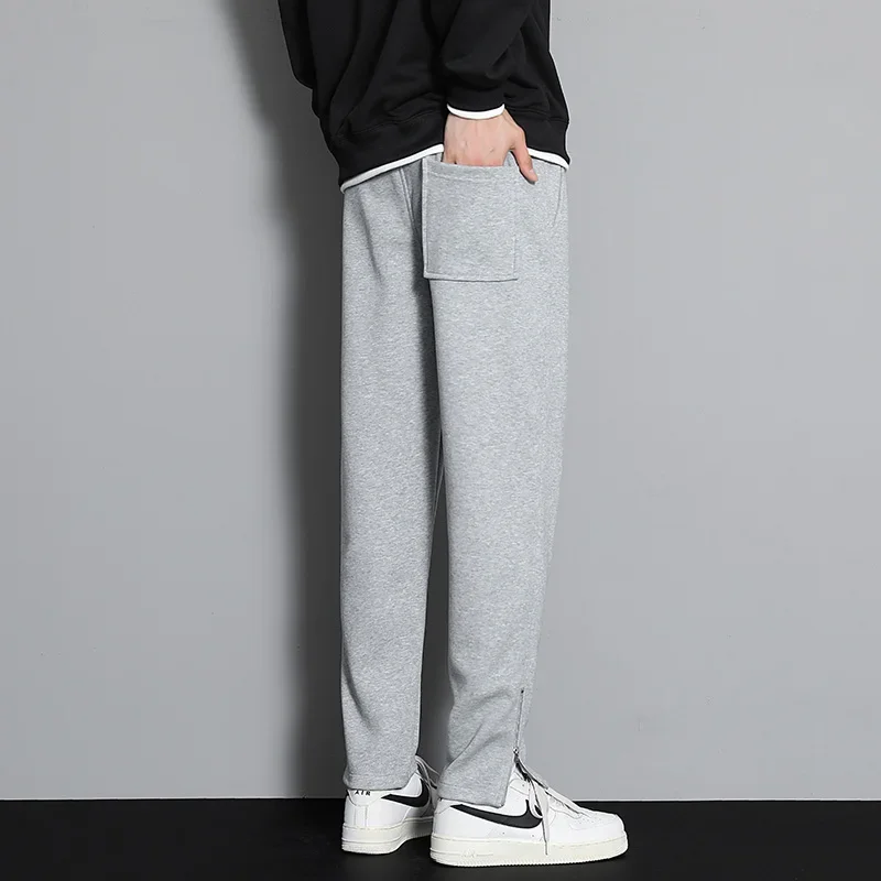 ملابس رياضية برباط بخصر مطاطي للرجال ربيع الخريف بنطلون رياضي متين بنطال واسع الساق مستقيم للرجال بناطيل عصرية فضفاضة غير رسمية