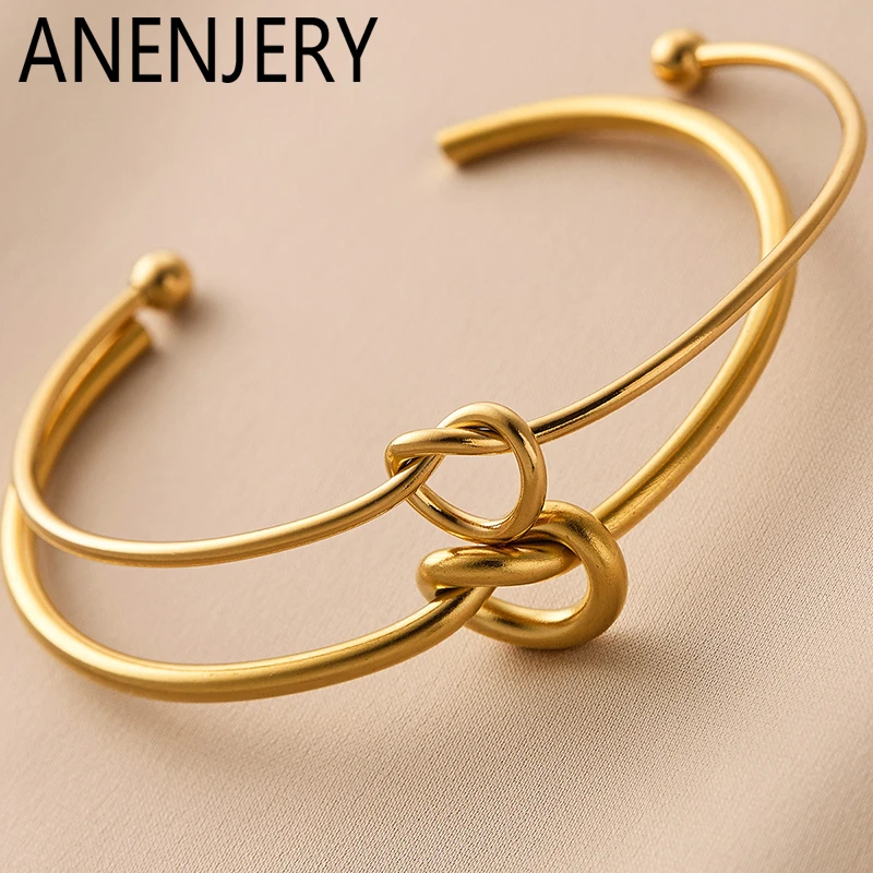 

ANENJERY 316L Stainless Steel Knot Heart Open Bracelet for Women Men Simple Personality Fashion Jewelry Wholesale