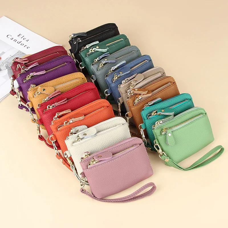 The first layer of cowhide hand-held small wallet, multi-card keychain coin change bag hand-held leather bag