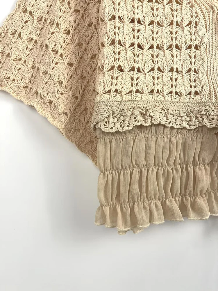 Europejskie i amerykańskie trendy jesiennej kolekcji damskiej: dzianinowy kardigan z krótkim rękawem, dekoltem w serek, sznurowaniem i łączonych elementów.