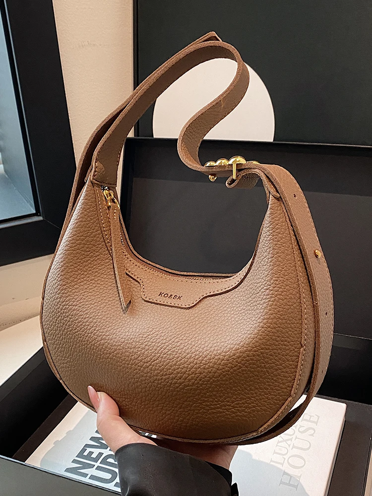 Luxury designer high-end fashion underarm bag female 2025 new wild popular one-shoulder messenger bag western style dumpling bag