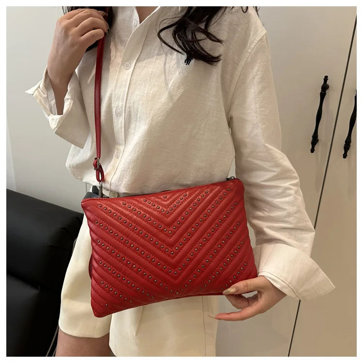 Embossed hot drill solid color stripe large capacity simple lady clutch multi-function shoulder envelope diagonal span bag