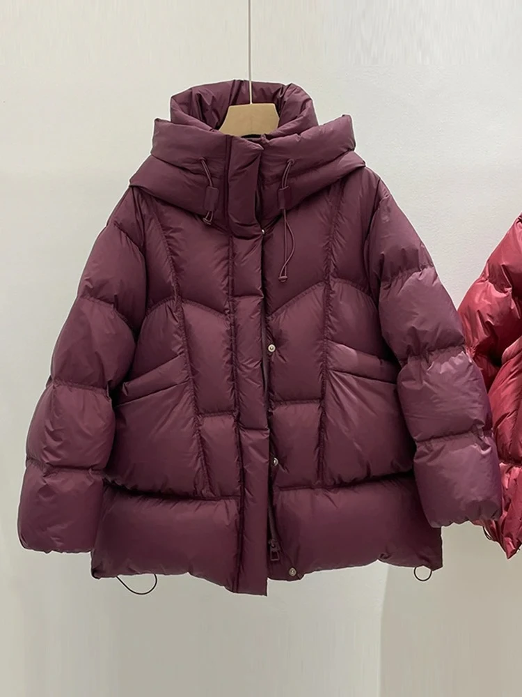 جديد شتاء 2026 سترة منتفخة سميكة للنساء دافئة بقلنسوة متوسطة الطول فضفاضة بلون سادة 90% معطف أبيض مبطن للأسفل #2