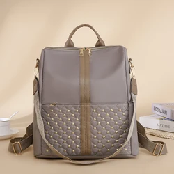 Semplicità zaino donna Oxford tinta unita grande capacità colori a contrasto zaino rivetto decorazione Design borsa da viaggio