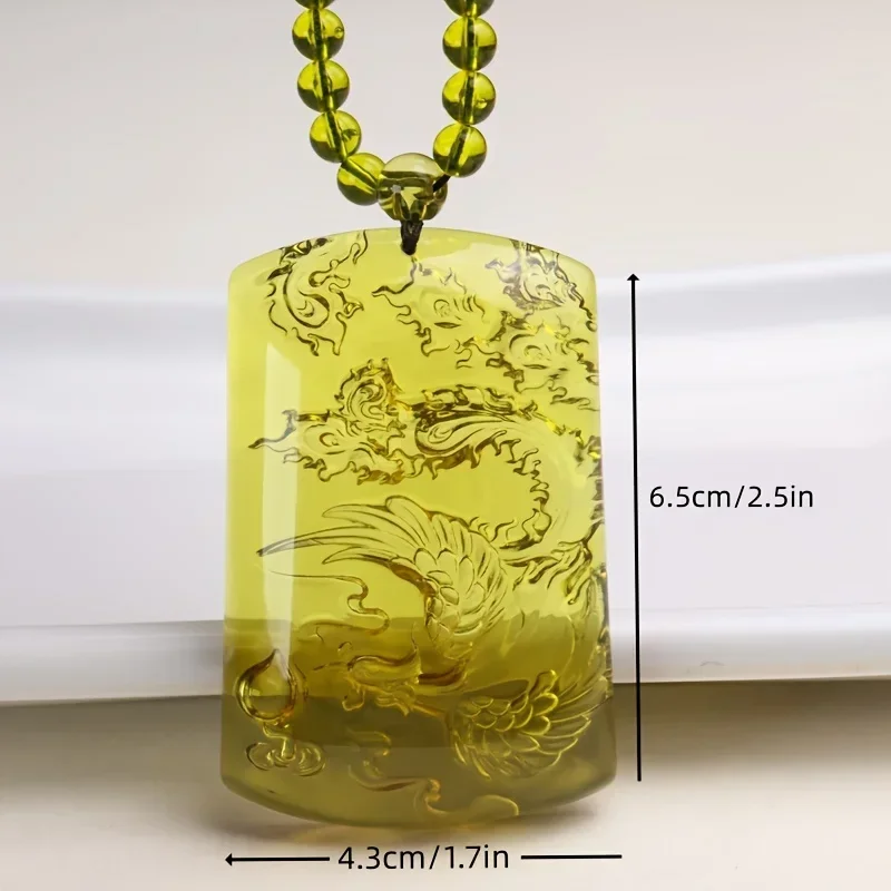 Gorgeous Unplated Resin Phoenix Pendant, Grade 7A Aqua Blue Amber, Discolored Under Ultraviolet Light