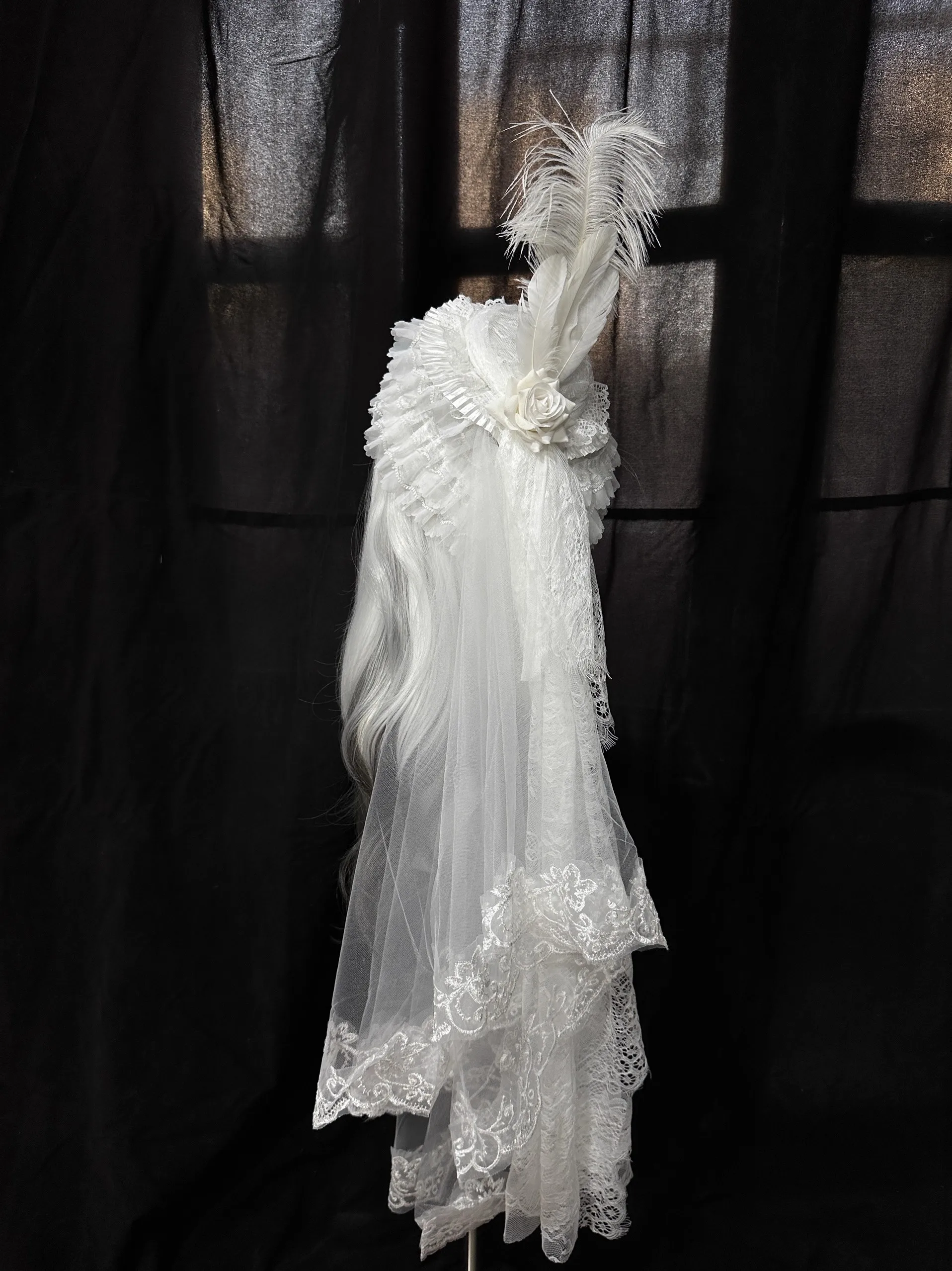 Elegant White Lace wedding Style Hat with Ruffled Details and Feather Accents